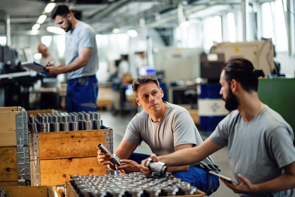 Essential Pros Staffing Franchise employees at work in factory